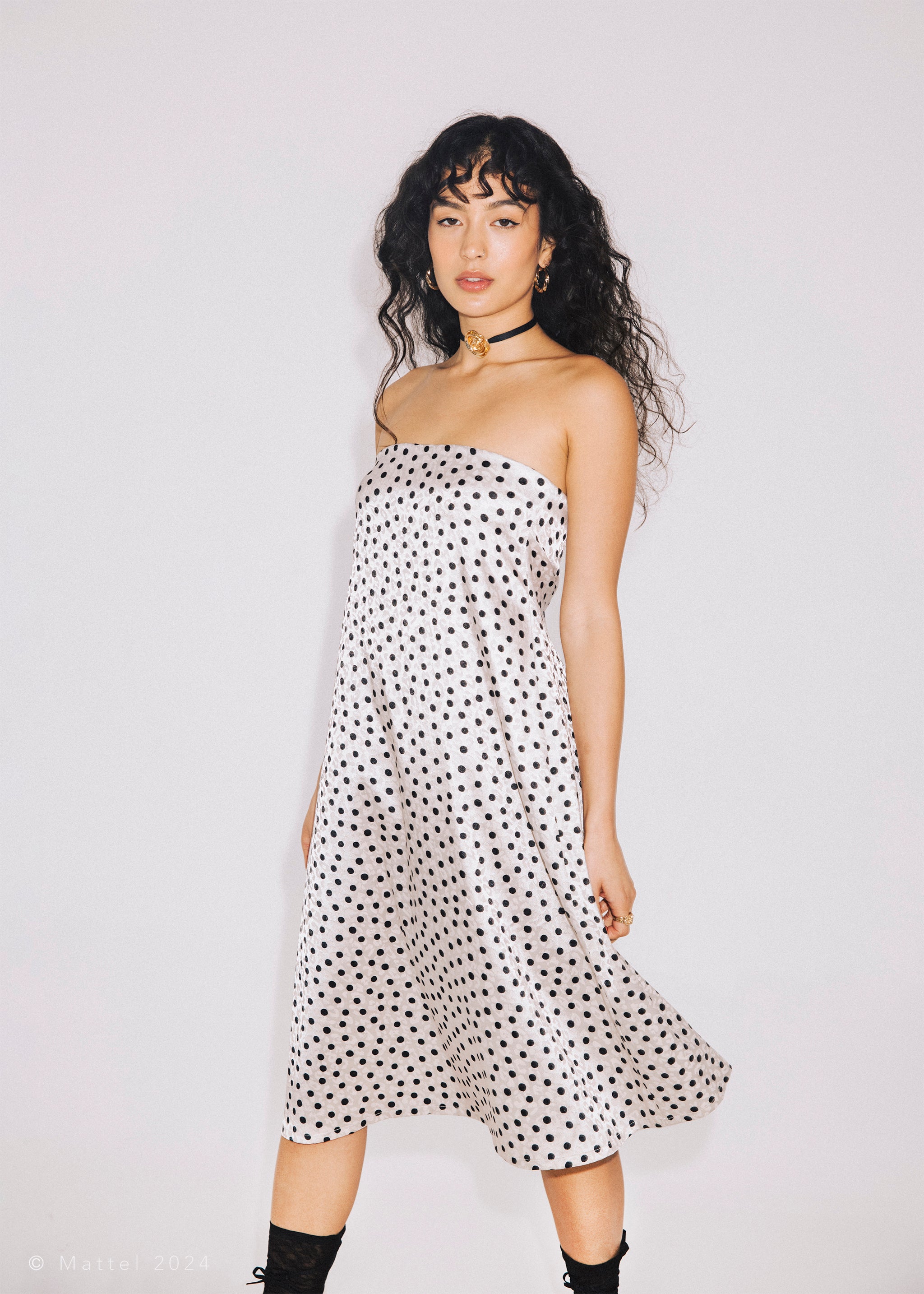 Stretch Polka Dot Fabric imposed over Animal Print